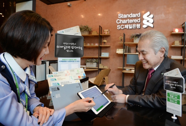 금융권 최초 은행-카드사 제휴, 'SC제일은행 삼성카드' 출시  