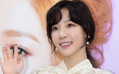 태연, 자카르타 공항서 봉변…팔목 잡아 끌고가려는 팬 저지당해