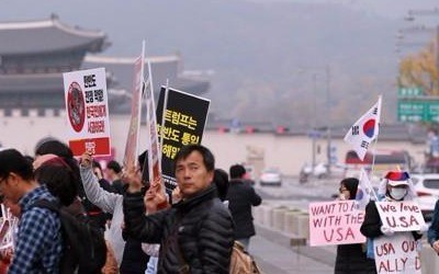 '트럼프 환영' vs '오지마'…목소리 갈라진 도심 집회