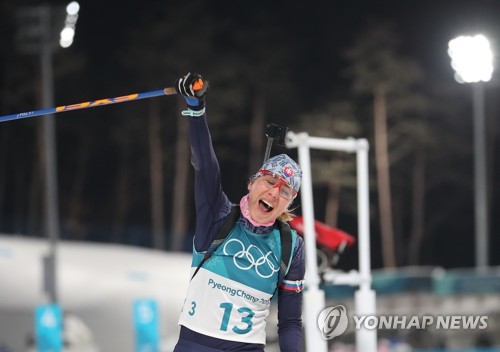 면역 질환 딛고 바이애슬론 은… 쿠즈미나는 '강한 엄마'