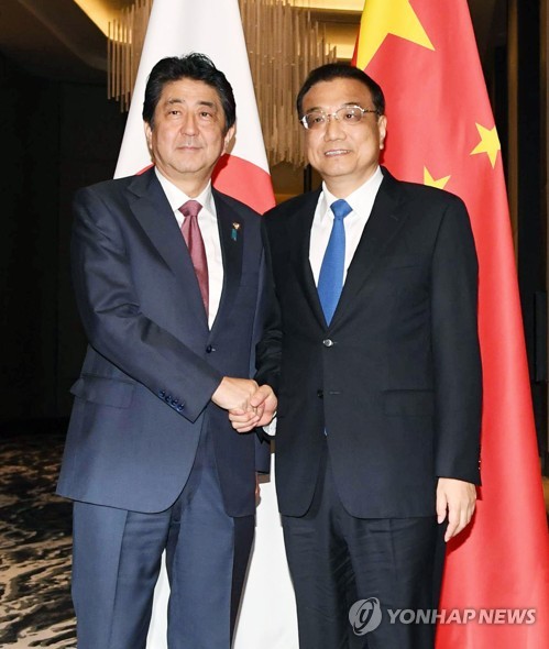 리커창 방일단 규모 '축소'… "일본은 시급한 외교현안서 국외자"