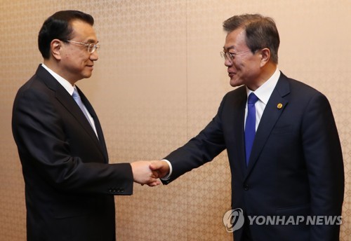 문대통령 "삼회노붕우"… 리커창 "만날수록 새로운 느낌"