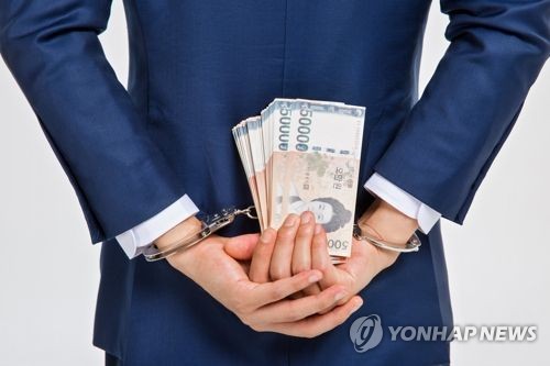 '기사 무마 목적' 1000만원 건네려던 지방선거 후보 인척 체포