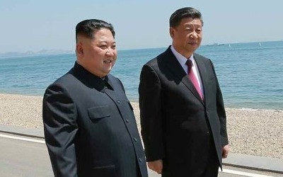 일본관방 "김정은-시진핑 회동, 중대한 관심갖고 분석 중"