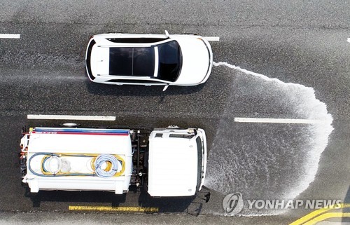 서울시, 32도 이상 폭염에 물 뿌려 도로 식힌다