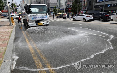 [최악폭염] 서울시, 아스팔트 온도 낮추는 '회색 포장' 실험