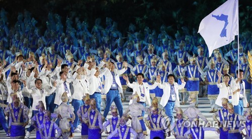 [아시안게임] 한반도기 휘날리며…손맞잡은 남북, 역대 11번째 공동입장