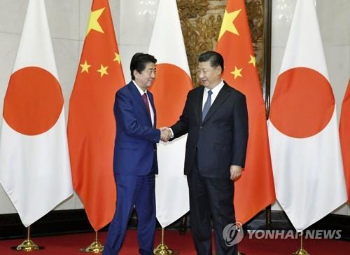 아베 방중 뭘 남겼나…中 '자유무역 우군' 日 '일대일로 티켓'