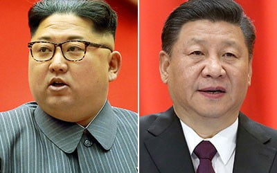 김정은 북한 국방위원장(왼쪽)과 시진핑 중국 국가주석. 자료사진