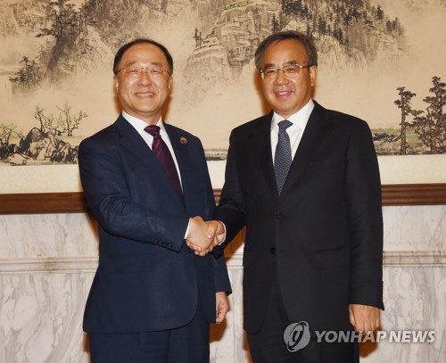 홍남기 만난 후춘화 "반도체조사 공정하게 처리할 것"