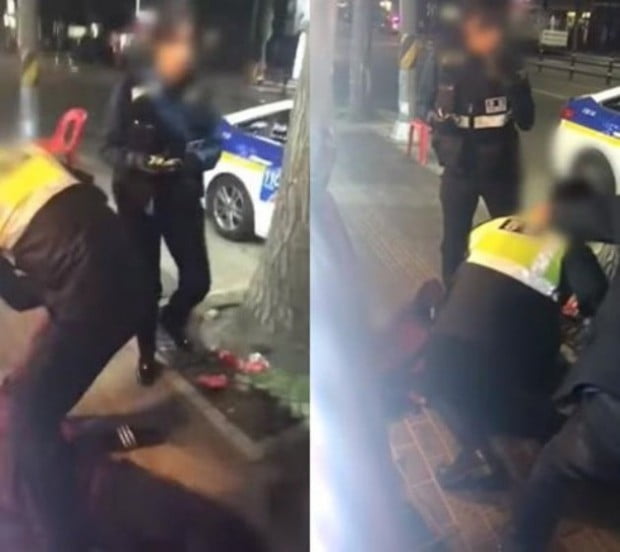 취객으로 보이는 남성 두 명과 남녀경찰이 몸싸움을 하는 모습. / 사진 = 온라인 커뮤니티