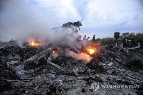 국제조사팀 "우크라 MH17 여객기 피격사건 용의자 4명 기소"(종합)