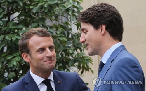 트뤼도 만난 마크롱 "EU-캐나다 무역협정 비준할 것"