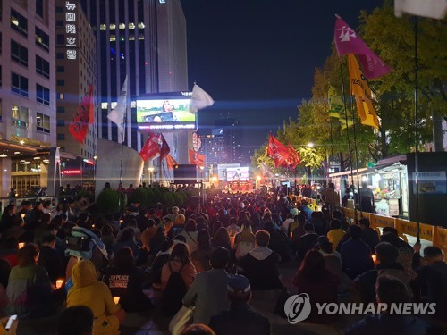 "톨게이트 노동자 전원 직접고용해야"…서울 도심서 촛불문화제