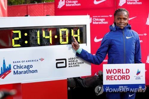 [고침] 체육(코스게이, 여자마라톤 세계신기록…2시간14분…)