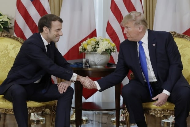 President Donald Trump meets French President Emmanuel Macron at Winfield House, Tuesday, Dec. 3, 2019, in London. (AP Photo/ Evan Vucci)