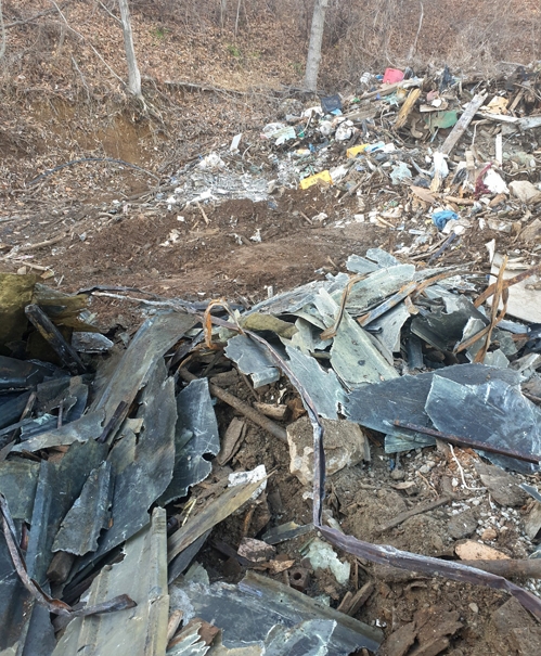서산 오토밸리 인근 야산서 불법 매립 산업폐기물 200t 발견