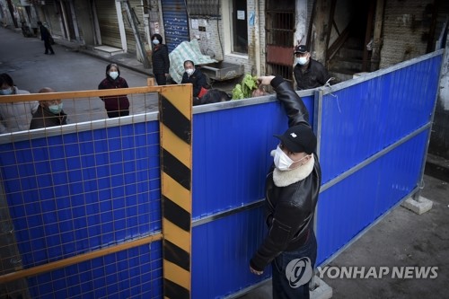 중국 '양회' 연기 속 코로나19 신규 확진 이틀째 600명 아래