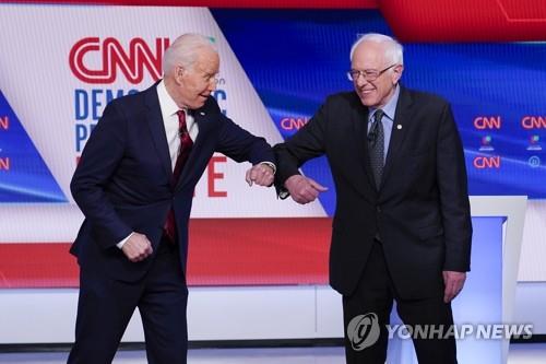 바이든, 선거자금 ⅓만 쓰고도 샌더스에 압승