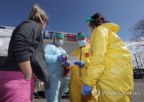 "미 일부 지역, 코로나19 확산 차단서 패배 인정…새 국면 진입"