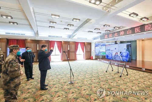 우한 첫 방문 시진핑…"코로나19 형세 전환, 보위전 승리해야"