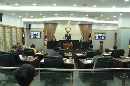 "해외연수 안 가겠다" 괴산·증평군의회, 예산 전액 반납