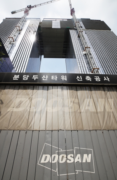 매각 작업 더뎠던 두산건설, 대우산업개발에 팔린다