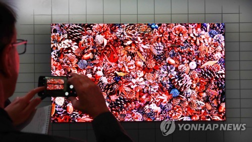 고개 드는 QD-OLED TV…"삼성·소니도 시제품 검토"