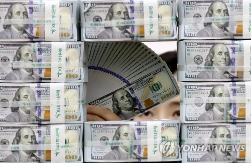 달러 약세·증시 호조 속 원/달러 환율 1,180원대로 떨어져
