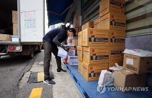 일자리위원회 "택배기사 주 5일 근무제 도입 검토해야"