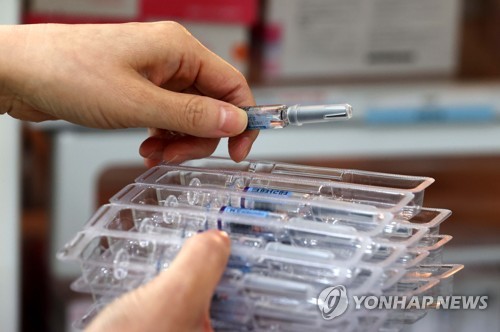 "편의 봐준다" 뒷돈받은 백신업체 임원…항소심 집유 석방