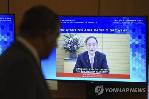 스가 총리 "국제 왕래 재개 필요…방역하면서 경제활동"