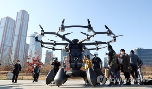 'Drone Taxi' crossed the Han River with bags of rice ... First 7-minute demo flight (included)