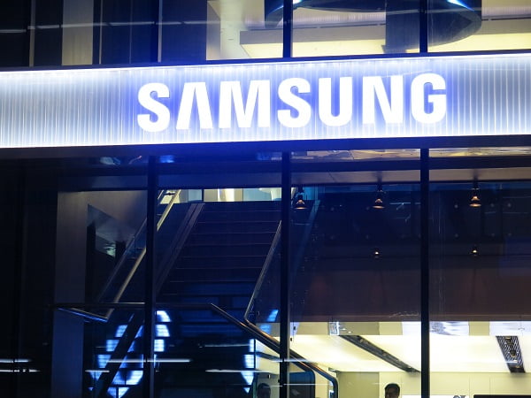 Bangkok, Thailand-January 20, 2017: Exterior view of a Samsung shop in the Siam Square area of Bangkok, Thailand. People walk around the area. The picture is taken from the walkway of sky train station.