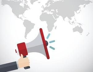 Flat design stylish vector illustration of hand holding megaphone with dotted world map.