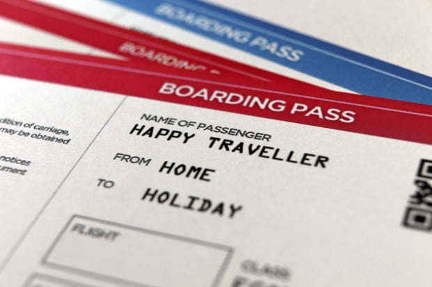 Happy tourists travel airplane ticket: boarding pass, home to holiday