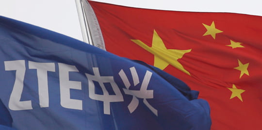 <YONHAP PHOTO-1225> A ZTE flag flutters in front of the Chinese national flag outside its headquarters in Shenzhen, Guangdong province April 17, 2012. Picture taken April 17, 2012.     To match Special Report MTN-IRAN/DOCUMENTS   REUTERS/Tyrone Siu/Files (CHINA  - Tags: POLITICS BUSINESS TELECOMS)/2012-08-30 14:10:51/
<저작권자 ⓒ 1980-2012 ㈜연합뉴스. 무단 전재 재배포 금지.>