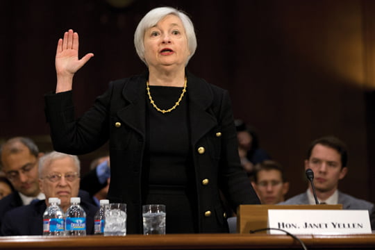 Janet Yellen, of California, President Barack Obama's nominee to become Federal Reserve Board chair, is sworn in on Capitol Hill in Washington, Thursday Nov. 14, 2013, prior to testifying before the Senate Banking Committee hearing on her nomination to succeed Ben Bernanke. (AP Photo/Jacquelyn Martin)