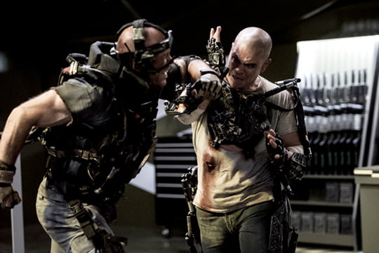 Matt Damon (right) stars in Columbia Pictures' ELYSIUM.