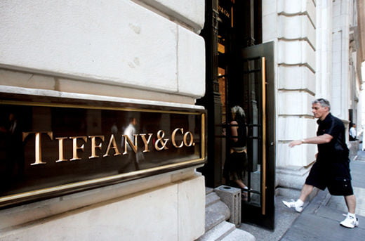 Customers enter a Tiffany store on Wall Street, Friday, Aug. 27, 2010, in New York. Tiffany & Co.'s second-quarter net income rose 19 percent on higher revenue as shoppers bought more of its high-end jewelry around the world, particularly in Asia and Europe. (AP Photo/Mark Lennihan)