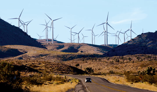 epa03427074 A picture made available on 09 October 2012 shows wind turbines in a mountain pass near Tehachapi in Kern County, California, USA, 08 October 2012.  Since 2002, wind power in California has doubled with a total of 4,287 megawatts. As of March 2012, wind energy  supplies about 5% of California's total electricity needs, or enough to power more than 400,000 households.  In 2011, 921 megawatts were installed mostly in the Tehachapi area and Kern County is currently reviewing wind projects that would generate a combined 4,600 megawatts of renewable energy if approved.  EPA/MICHAEL NELSON