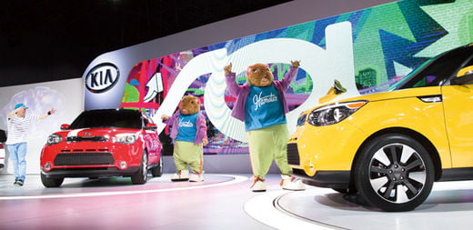 Dancers take the stage as the 2014 Kia Soul is unveiled during the 2013 New York International Auto Show at the Jacob K. Javits Convention Center, Wednesday, March 27, 2013, in New York. (AP Photo/John Minchillo)