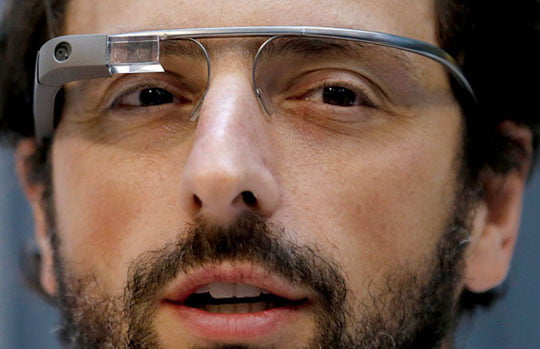 Google co-founder  Sergey Brin wears Google Glass glasses at an announcement for the Breakthrough Prize in Life Sciences at Genentech Hall on UCSF’s Mission Bay campus in San Francisco, Wednesday, Feb. 20, 2013. (AP Photo/Jeff Chiu)