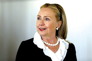 U.S. Secretary of State Hillary Rodham Clinton walks to reception at the Indiana Teahouse at Cottesloe Beach, near Perth, Australia, Wednesday, Nov. 14, 2012. (AP Photo/Matt Rourke, Pool)