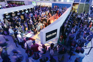 COMMERCIAL IMAGE - In this photo taken by AP Images for Sony Computer Entertainment America, guests line up to play Gods of War Ascension at the PlayStation booth at E3 on Tuesday, June 5, 2012 in Los Angeles. (Chris Weeks/AP Images for Sony Computer Entertainment America)