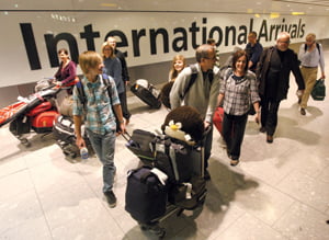 <YONHAP PHOTO-0210> Passengers arrive at London's Heathrow Airport after flying in on a British Airways flight from Vancouver, the first to land at the airport after Britain's skies reopened late Tuesday April 20, 2010. Airlines rushed to reorganise schedules after the Civil Aviation Authority (CAA) eased the rules allowing a phased reopening of airspace following the closure due to Icelandic volcanic ash. (AP Photo/ Dominic Lipinski/PA ) ** UNITED KINGDOM OUT NO SALES NO ARCHIVE **/2010-04-21 07:03:21/
<저작권자 ⓒ 1980-2010 ㈜연합뉴스. 무단 전재 재배포 금지.>