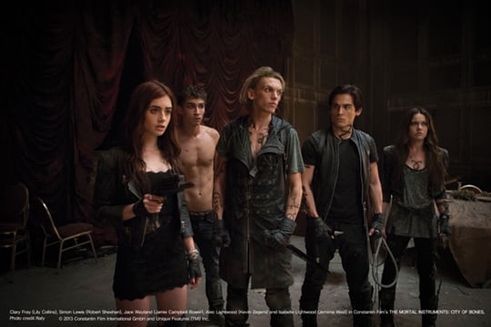 Clary (Lily Collins, Simon (Robert Sheehan), Jamie Campbell Bower, Kevin Zegers,, Jemima West) at the Hotel Dumort in Screen Gems' fantasy-action THE  MORTAL INSTRUMENTS: CITY OF BONES.