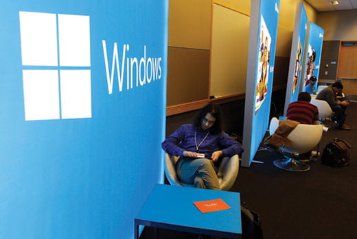 Marko Kokol, an app developer from Slovenia, works on a touch-screen tablet, Wednesday, Oct. 31, 2012, as he attends "Build," Microsoft Corp.'s developers conference, in Redmond, Wash. More than 2,000 app developers and other tech-industry workers are in Redmond for the conference, which is heavily focused this year on developing apps for devices running Microsoft's new Windows 8 operating system. (AP Photo/Ted S. Warren)