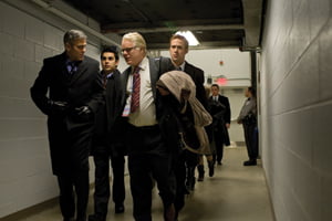 (l to r, front to back)Governor Morris (George Clooney) and his team - Paul (Philip Seymour Hoffman), Ben (Max Minghella) and Stephen (Ryan Gosling) head out after the Town Hall meeting in Columbia Pictures' political thriller THE IDES OF MARCH.