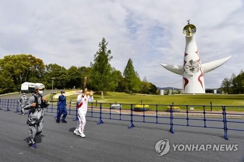 日코로나 확산 속 오사카구간 도로 성화봉송 취소…공원서 진행